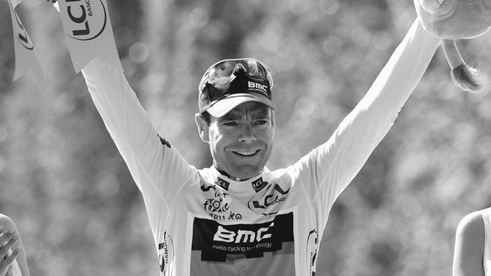Cadel Evans celebrates 2011 Tour de France victory on the podium