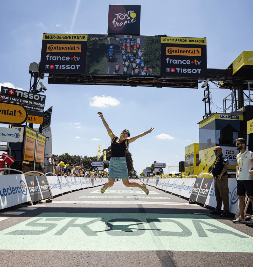 Fan celebrates at Tour de France finish line in Mûr-de-Bretagne